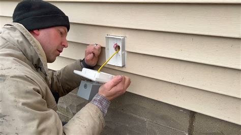 how to install a new junction box in siding|electrical box for vinyl siding.